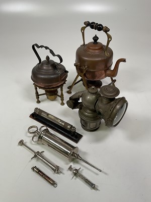 Lot 101 - A Calcia King bike lamp, various veterinarian...