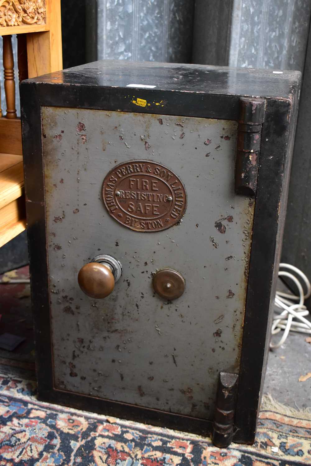 Lot 2296 - A Victorian cast iron safe with applied plaque...