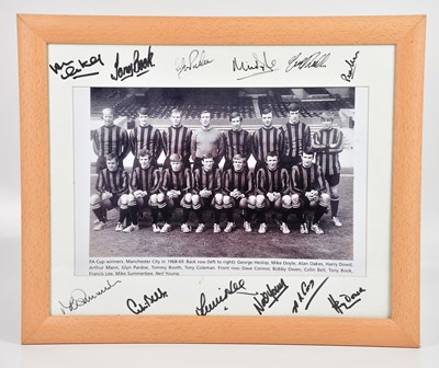 Lot 1345 - MANCHESTER CITY INTEREST; a framed photograph...