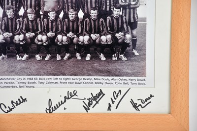 Lot 1345 - MANCHESTER CITY INTEREST; a framed photograph...