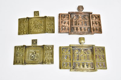 Lot 1047 - Three decorative brass and one copper...