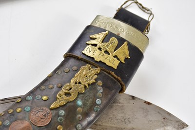 Lot 698 - A Gurka kukri knife with applied Nepal emblem...