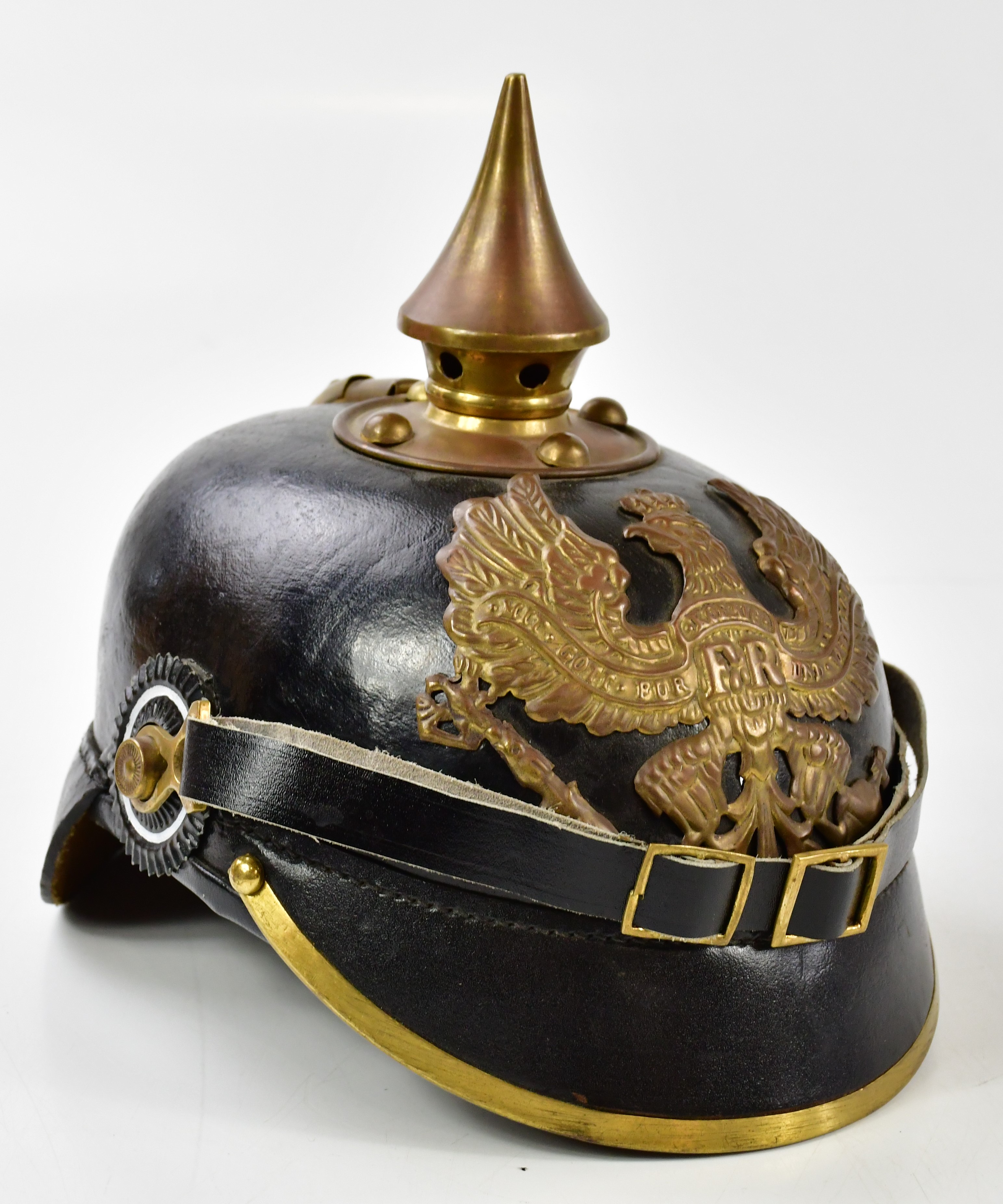 Picklehelm R78 Lot 456 - A reproduction pickelhaube with replaced