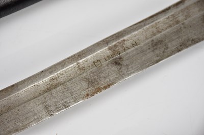 Lot 727 - An Indian sword with brass handle and carved...