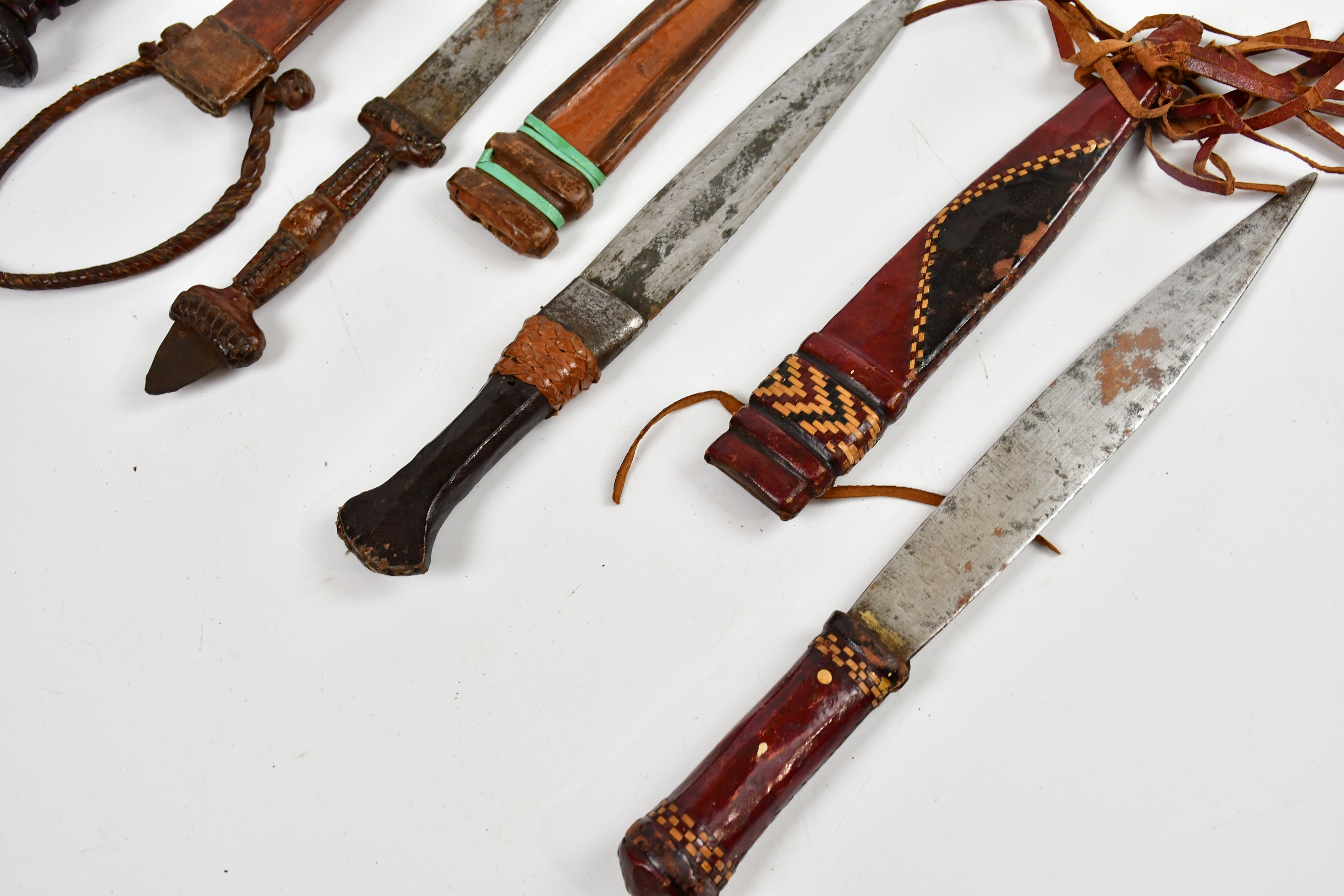 Lot 718 - A collection of African and Eastern daggers