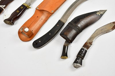 Lot 719 - A collection of knives/daggers, including two...