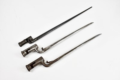 Lot 724 - Three 19th century socket bayonets, including...