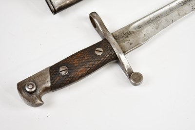 Lot 725 - A Spanish Bolo bayonet and scabbard, with a...