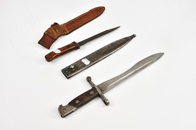Lot 725 - A Spanish Bolo bayonet and scabbard, with a...