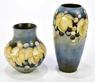 Lot 70 - WALTER MOORCROFT; two salt glazed vases...