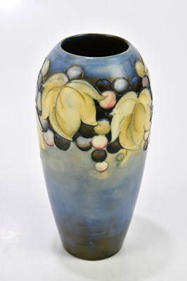 Lot 70 - WALTER MOORCROFT; two salt glazed vases...
