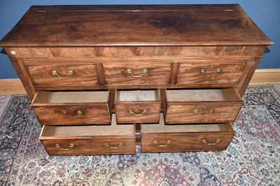 Lot 13 - A 19th century inlaid mahogany mule chest, the...