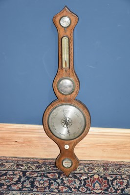 Lot 6376 - A Regency painted wheel barometer with...