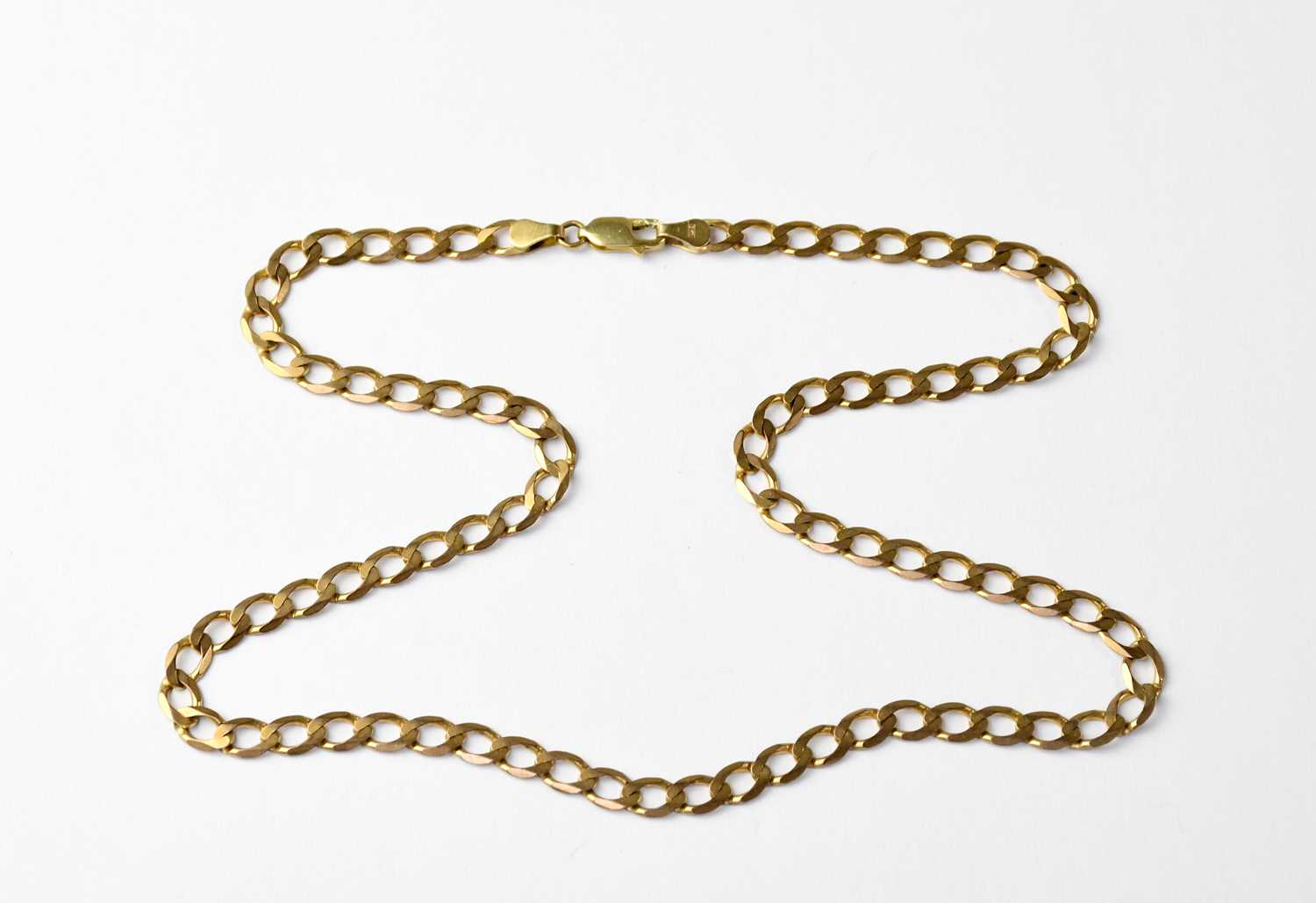 Lot 963 - A 9ct gold flat curb necklace