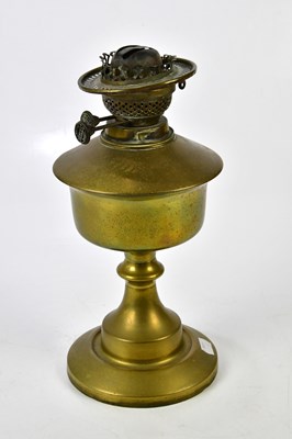 Lot 2240 - Two brass oil lamps, one with glass fount and...