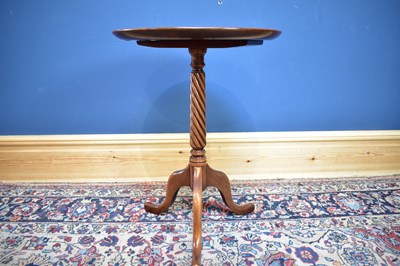 Lot 2476 - A reproduction mahogany tripod table with dish...
