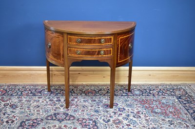Lot 2518 - A reproduction mahogany demi-lune side cabinet...