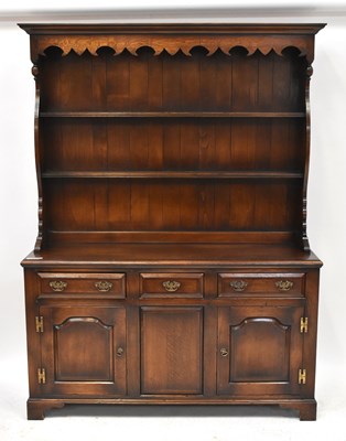 Lot 60 - GOSTIN; a Georgian-style oak dresser with...