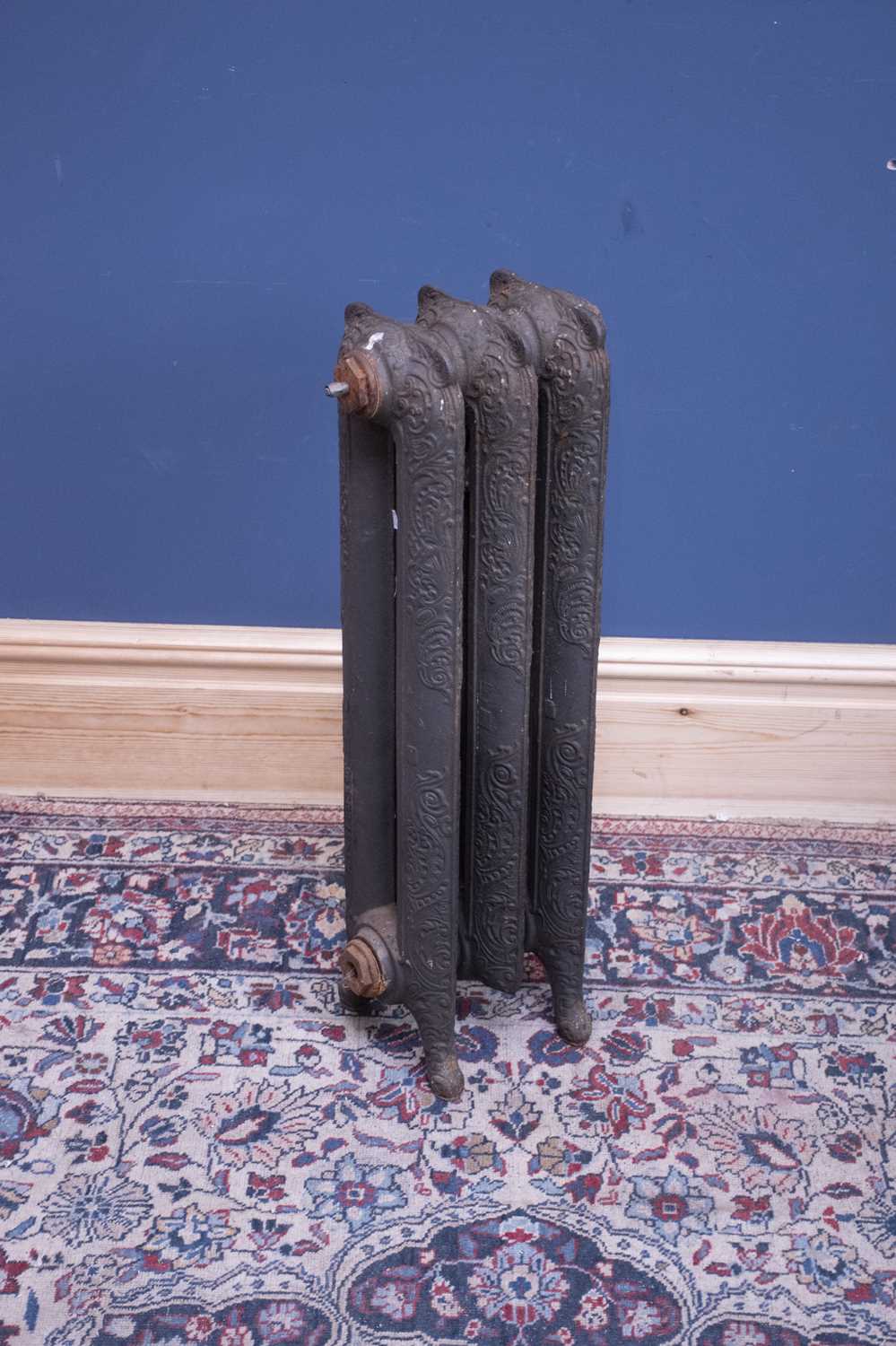 Lot 2307 - A vintage cast iron radiator, height 75cm,...