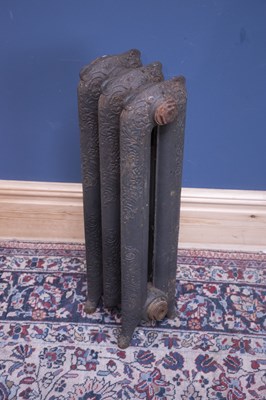 Lot 2307 - A vintage cast iron radiator, height 75cm,...