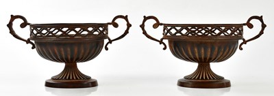 Lot 415 - A pair of decorative cast metal twin handled...