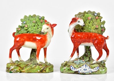 Lot 2047 - Two 19th century Staffordshire figures of deer,...