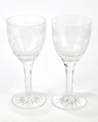 Lot 371 - Two identical oversized clear glass goblets,...