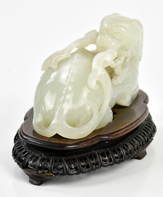 Lot 1000 - A fine 18th century Chinese white jade carving...