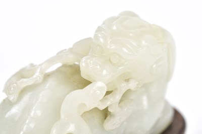 Lot 1000 - A fine 18th century Chinese white jade carving...