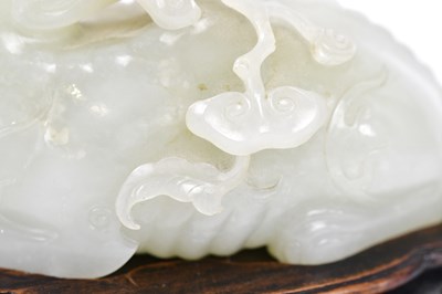 Lot 1000 - A fine 18th century Chinese white jade carving...