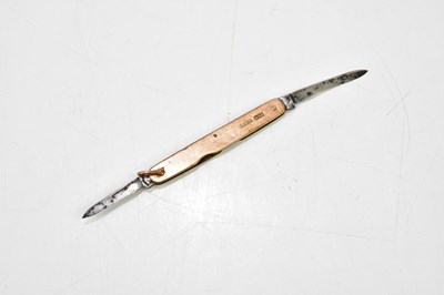 Lot 21 - Two 9ct yellow gold faced pocket knives, one...
