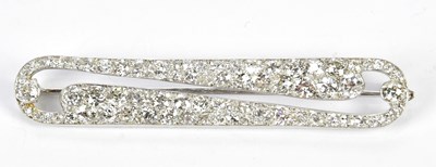 Lot 564 - An Art Deco designed white metal and diamond...