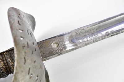 Lot 1628 - A WWI officer's sword and scabard.
