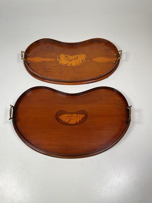 Lot 38 - A contemporary yew wood and inlaid kidney...