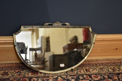 Lot 134 - An Art Deco chrome mounted wall mirror with...