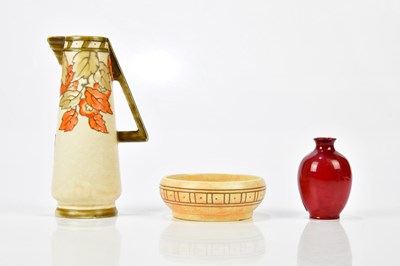 Lot 2248 - ROYAL DOULTON; a flambé miniature vase of...