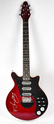 Lot 1143 - SIR BRIAN MAY; a 'Special Red' signed guitar.