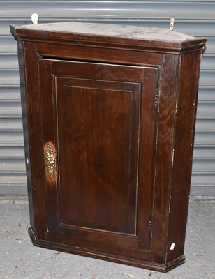 Lot 113 - A George III hanging corner cupboard, height...