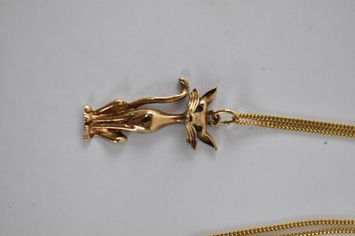 Lot 736 - A 9ct yellow gold pendant modelled as a cat,...