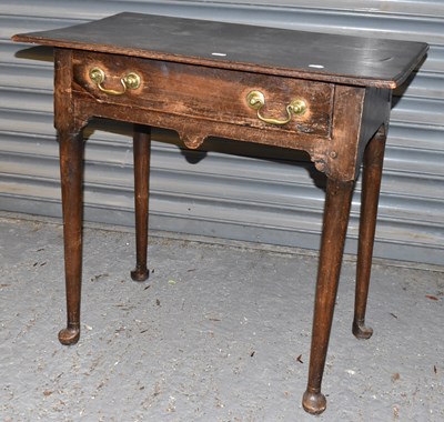 Lot 103 - An oak side table with rectangular top and...