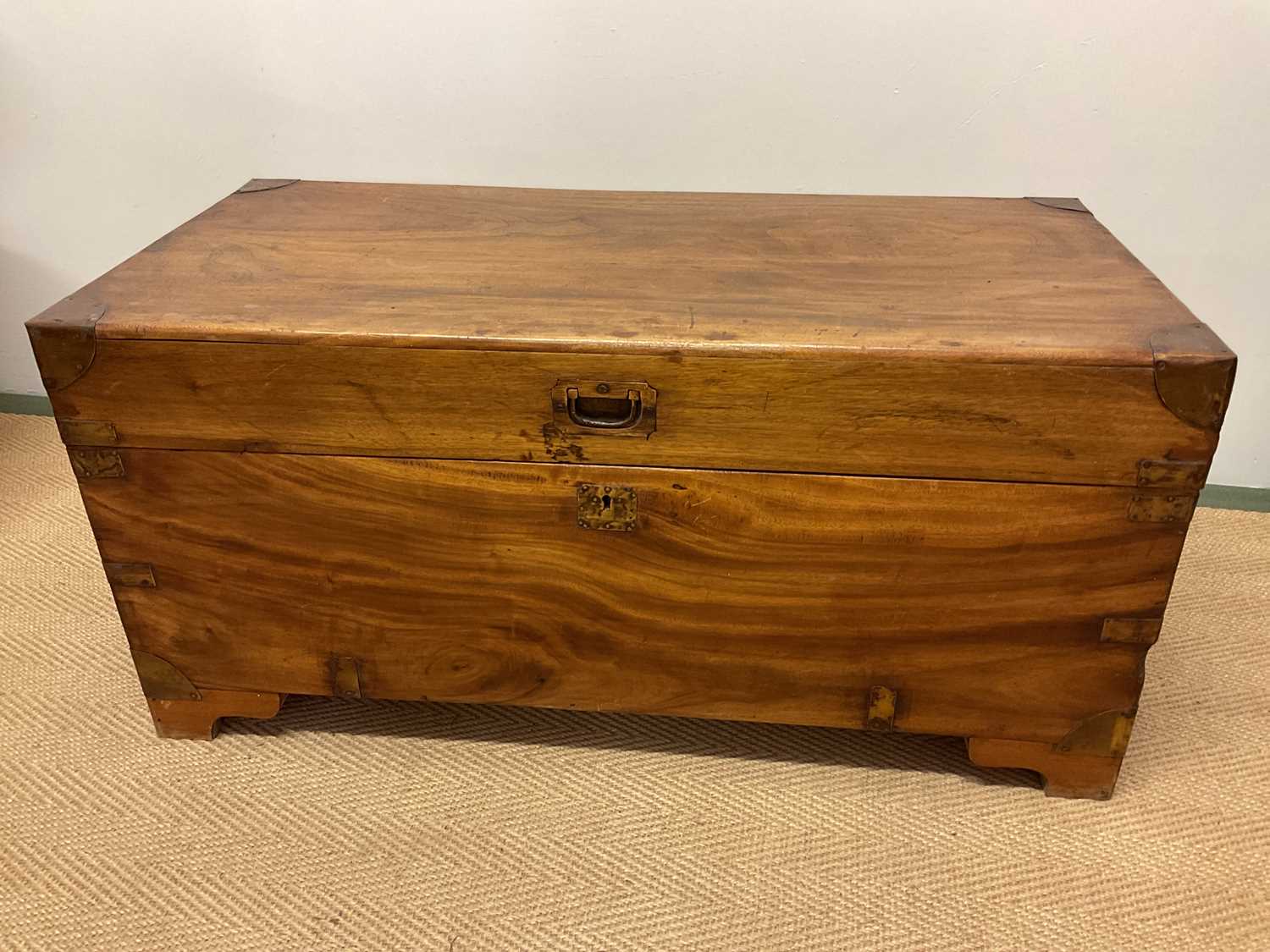 Lot 432 A camphor wood blanket box with brass mounts,
