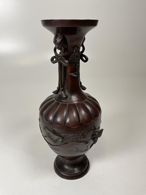 Lot 234 - A Japanese Meiji period bronze vase, decorated...