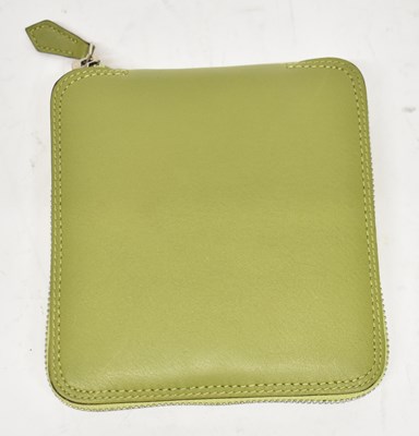 Lot 604 - HERMES; a small lime green calf skin pouch...