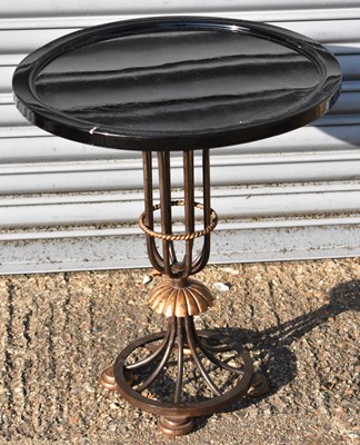 Lot 85 - A contemporary occasional table with ebonised...