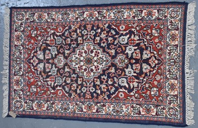 Lot 130 - A Persian hand knotted carpet, 150 x 90cm.