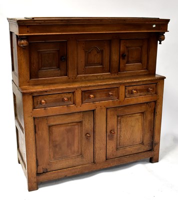 Lot 7 - An 18th century oak court cupboard