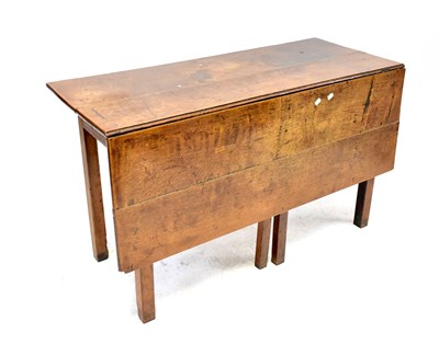 Lot 9 - A Georgian oak double gateleg single drop-leaf table