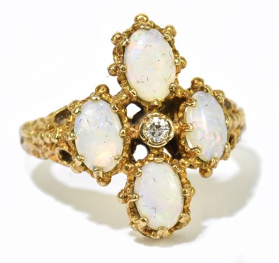 Lot 1068 - A 9ct yellow gold opal and diamond ring,...