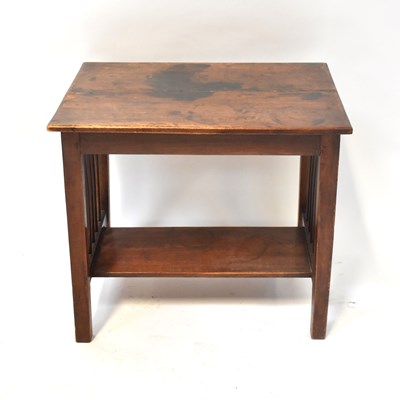 Lot 30 - A mahogany side table with rectangular plank...