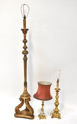 Lot 78 - A carved gold-coloured standard lamp in the...